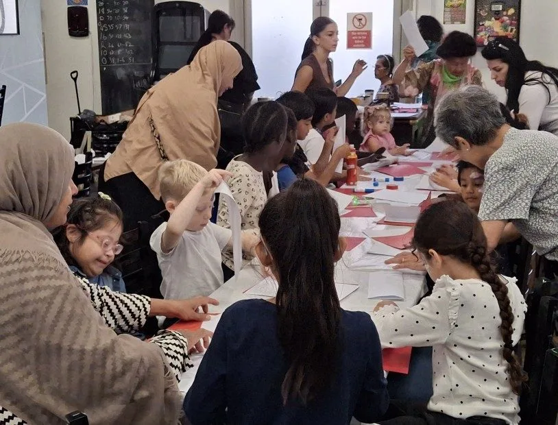 Children making card swords and learning the Chinese Sword Dance