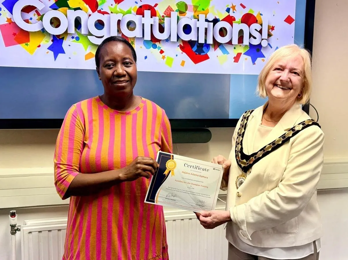 Families for Life Champions receiving certificates from the Mayor of Camden