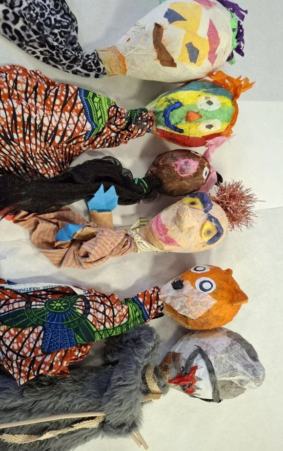 Children making puppets and putting on puppet shows
