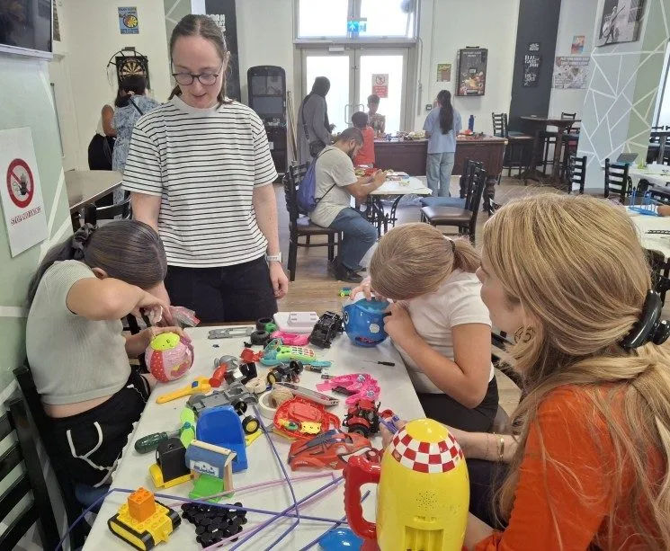 Children taking part in Science Owl hands-on science workshops