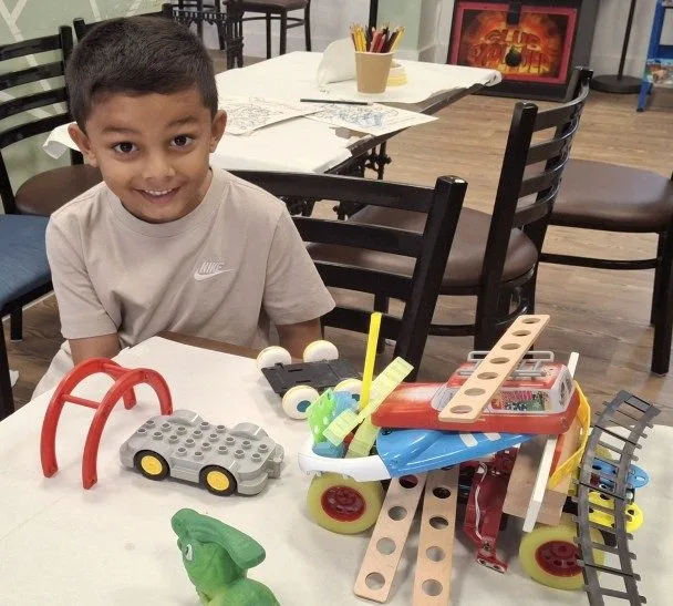 Children taking part in Science Owl hands-on science workshops