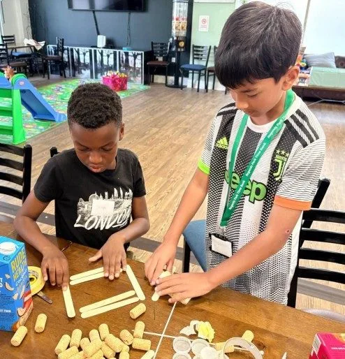 Children taking part in Science Owl hands-on science workshops