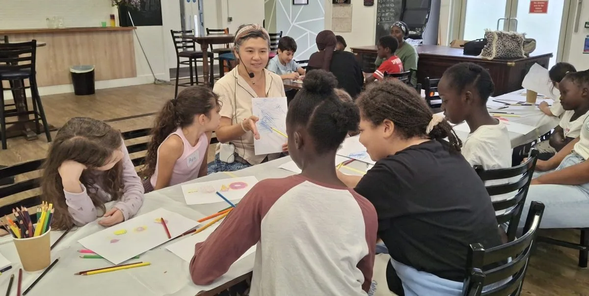 Children at The Story-Makers Club writing session with Sheryl Sze